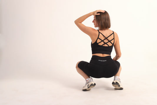 Black multi strap sports bra